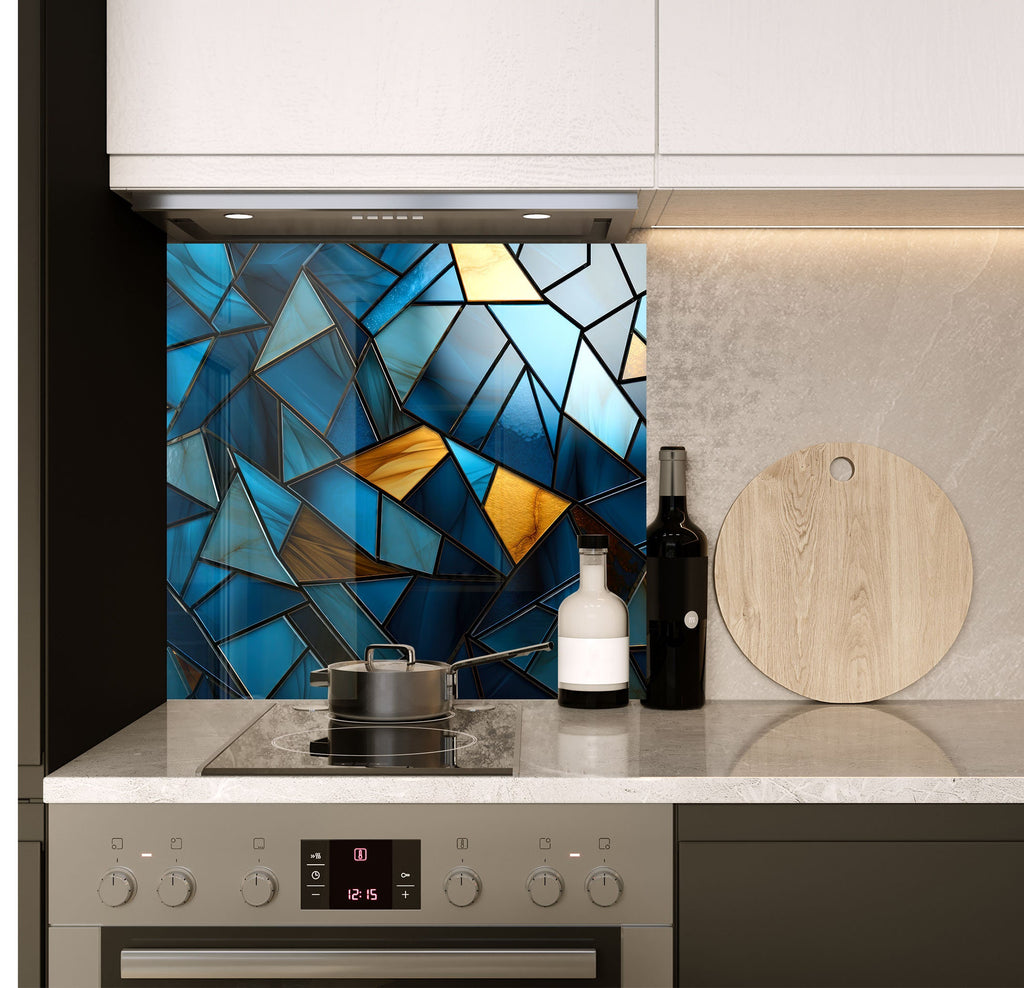 a stove top oven sitting under a stained glass window