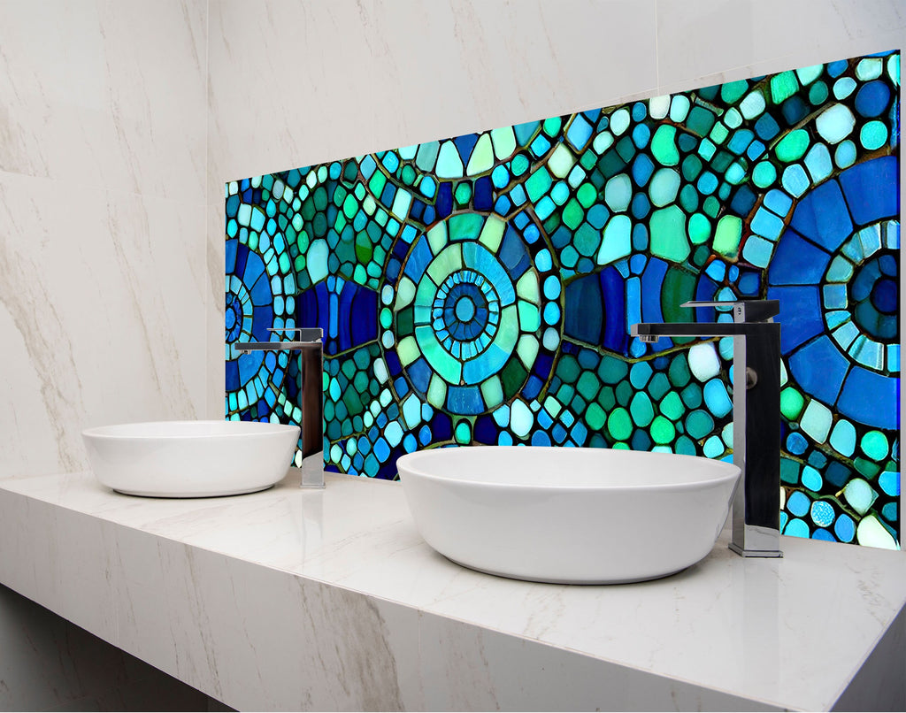 a bathroom with two sinks and a mosaic tile wall