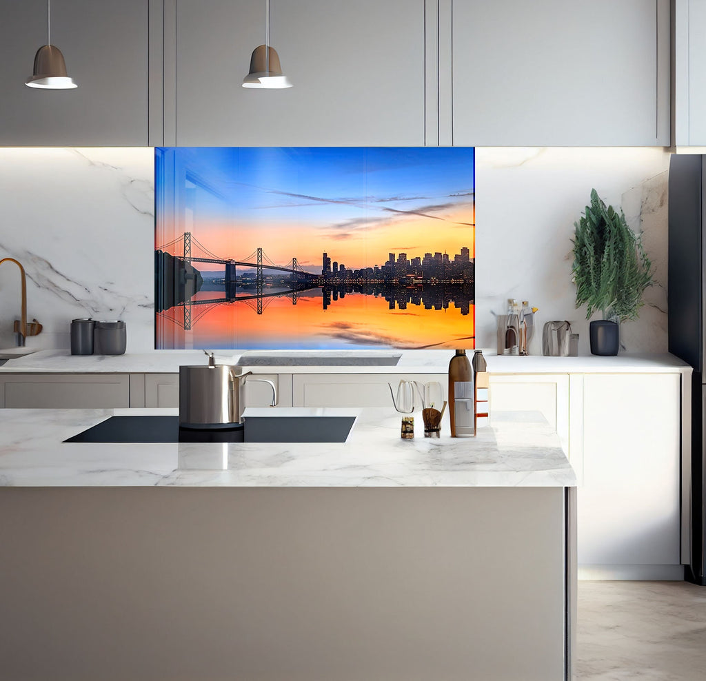 a kitchen with a large picture hanging on the wall