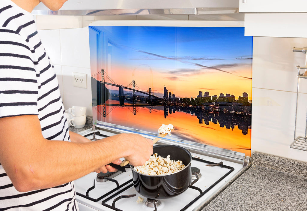 a man is cooking popcorn on the stove