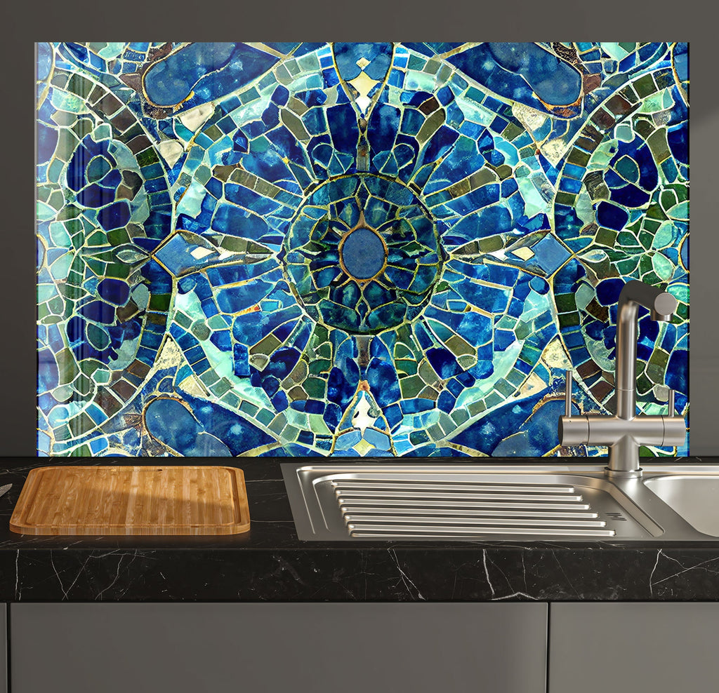 a kitchen counter with a sink and a mosaic tile backsplash