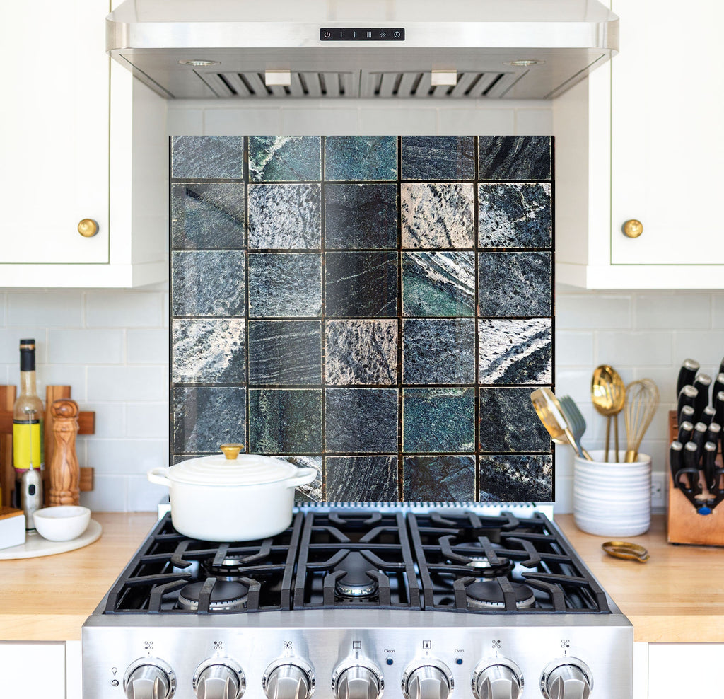 a stove top oven sitting inside of a kitchen