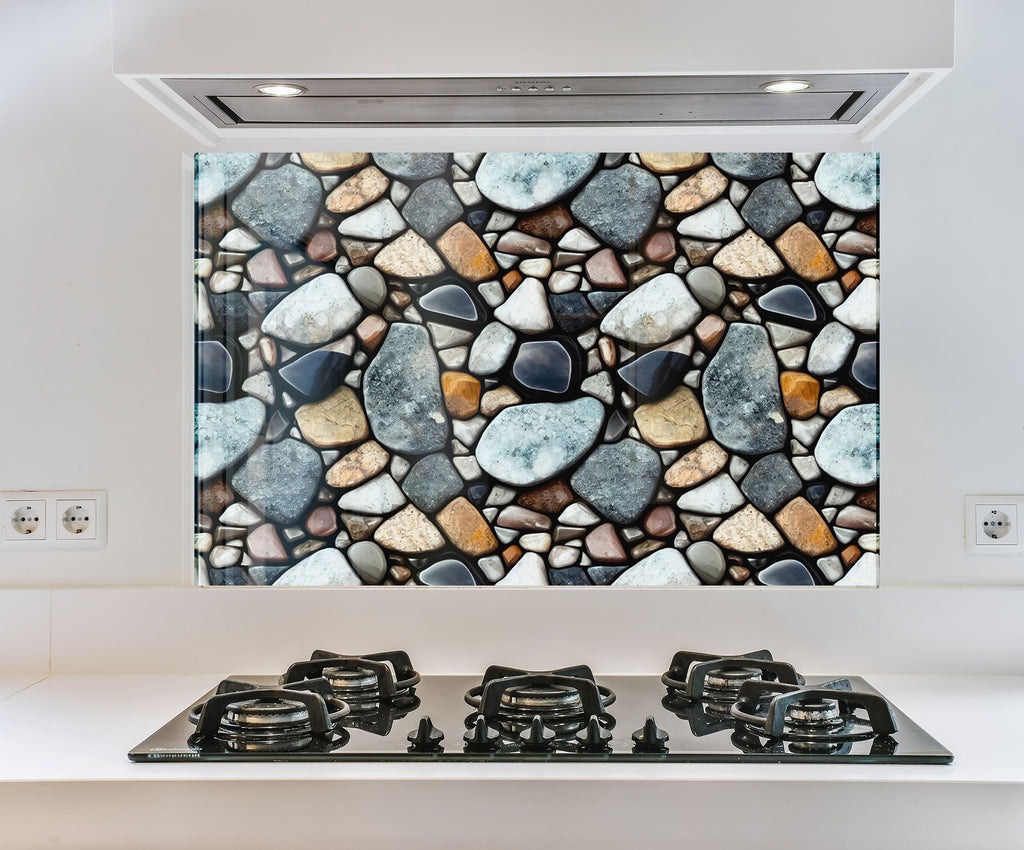 a kitchen with a stove and a picture of rocks on the wall