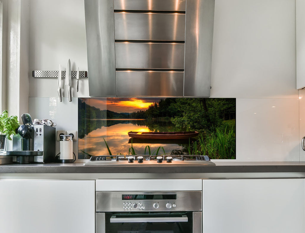 a stove top oven sitting inside of a kitchen