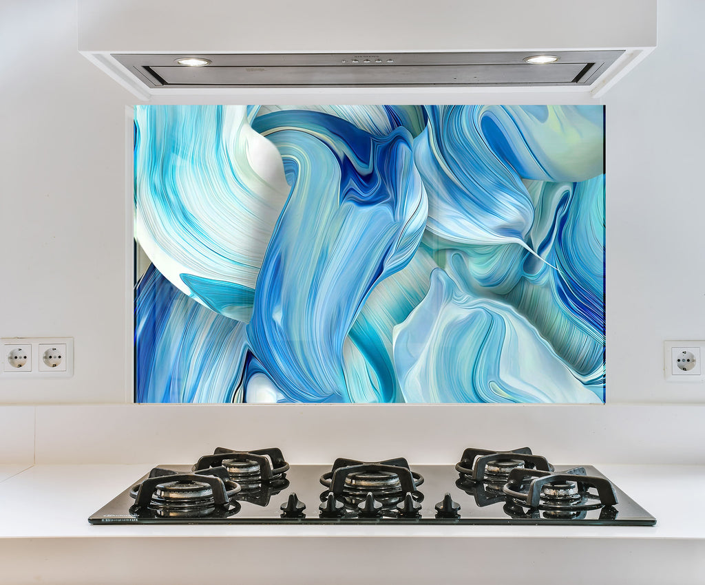 a picture of a blue and white painting on a wall above a stove