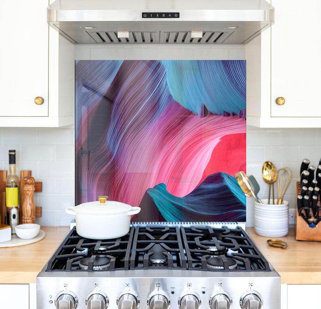 a stove top oven sitting inside of a kitchen