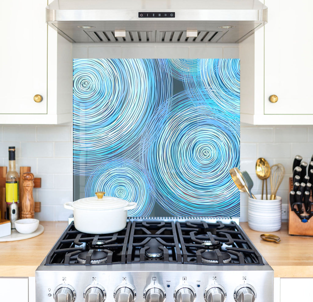 a stove top oven sitting inside of a kitchen