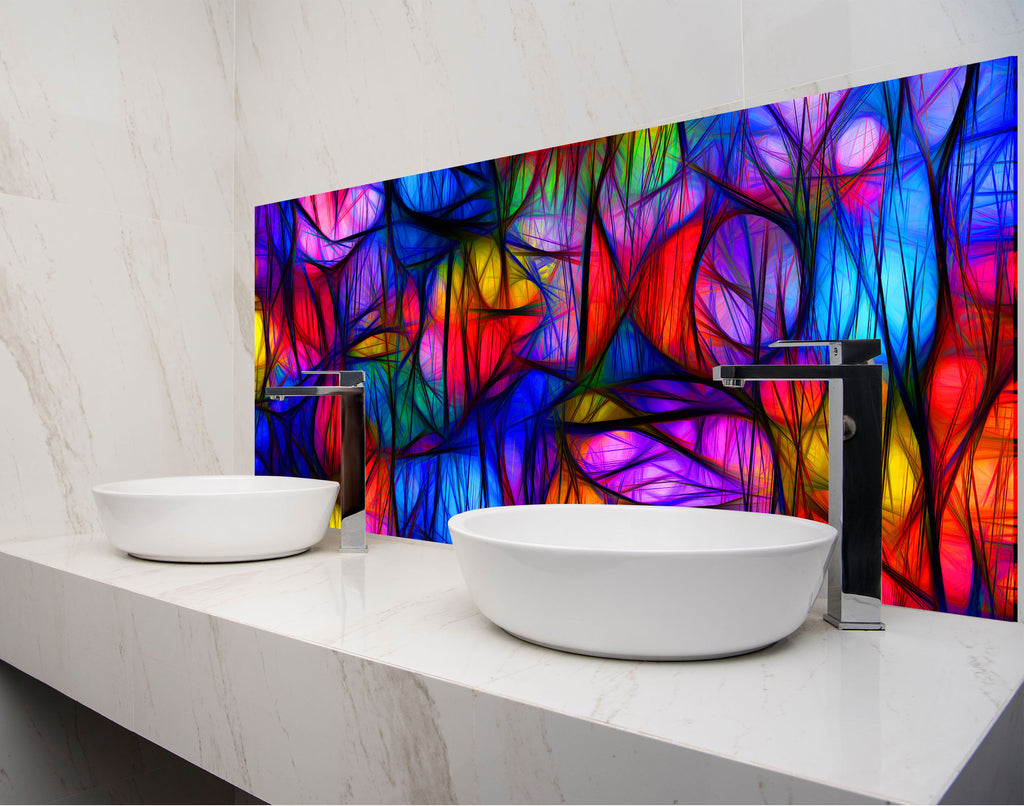 two white bowls on a counter in front of a colorful wall