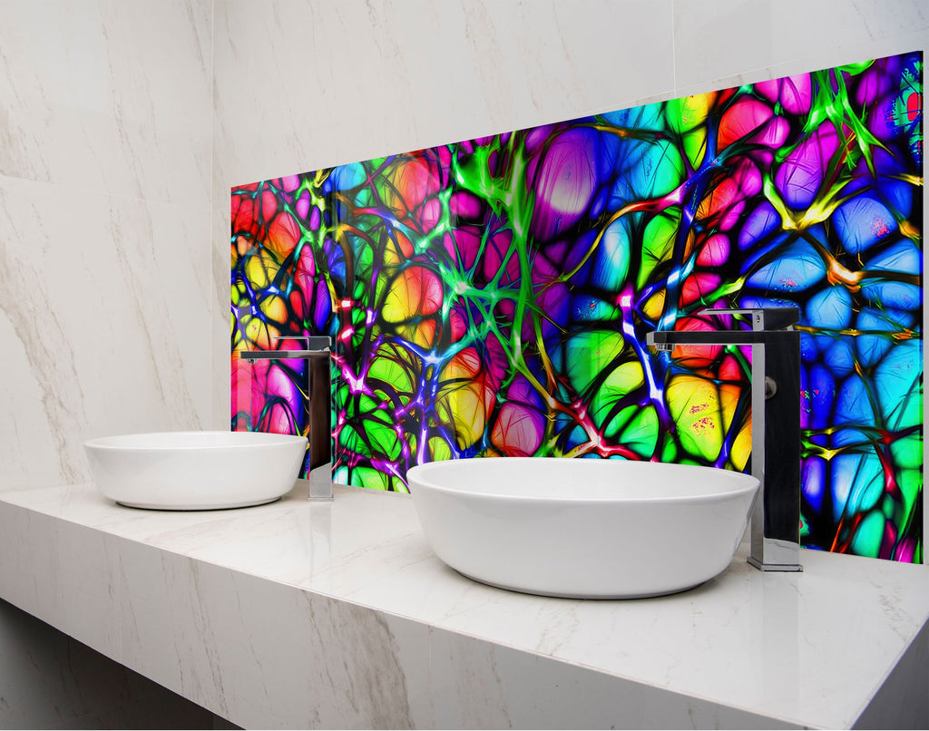 two white bowls on a counter in front of a colorful wall