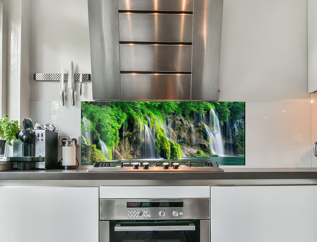 a kitchen with a stainless steel stove top oven