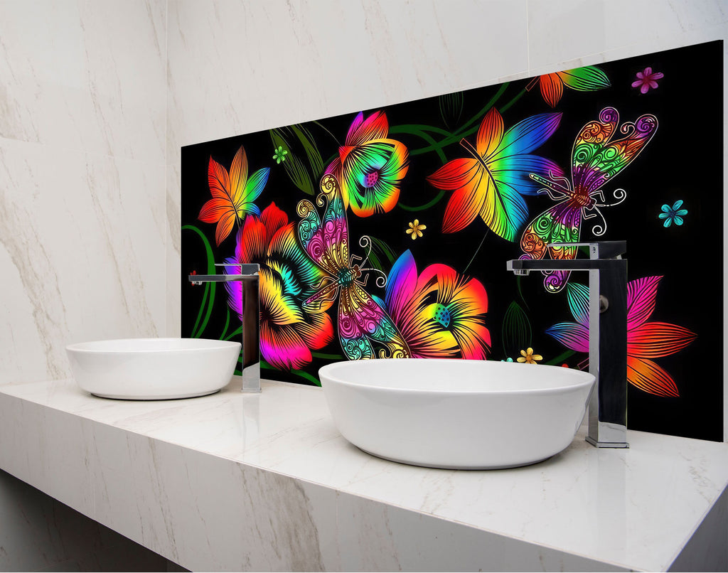 two white bowls on a counter with a colorful wallpaper behind them