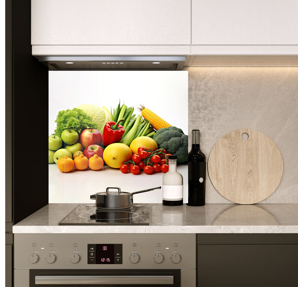 a kitchen counter with a cutting board and various fruits and vegetables on it