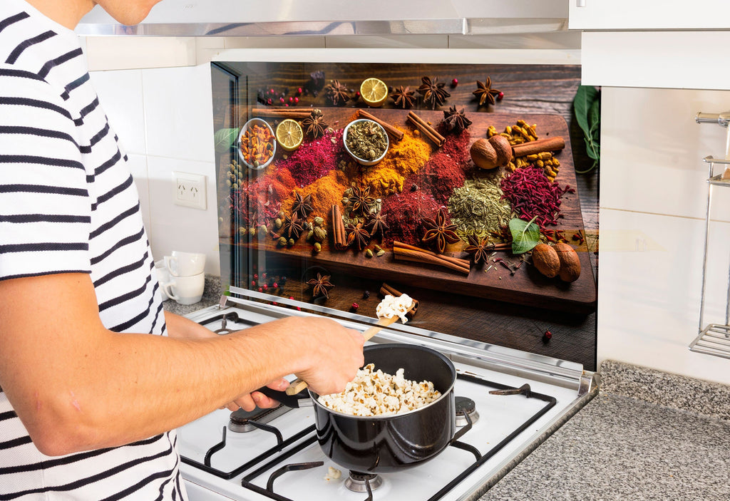 a person cooking food on a stove top