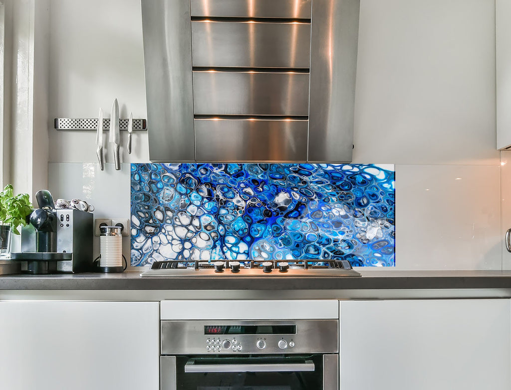 a stove top oven sitting inside of a kitchen