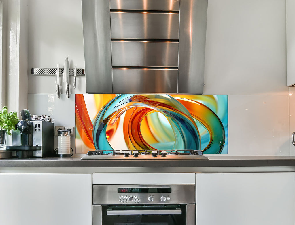 a kitchen with stainless steel appliances and a painting on the wall