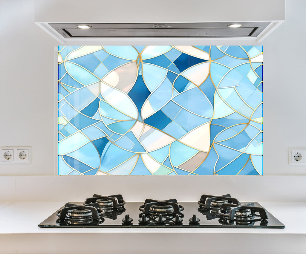 a stove top oven sitting under a stained glass window