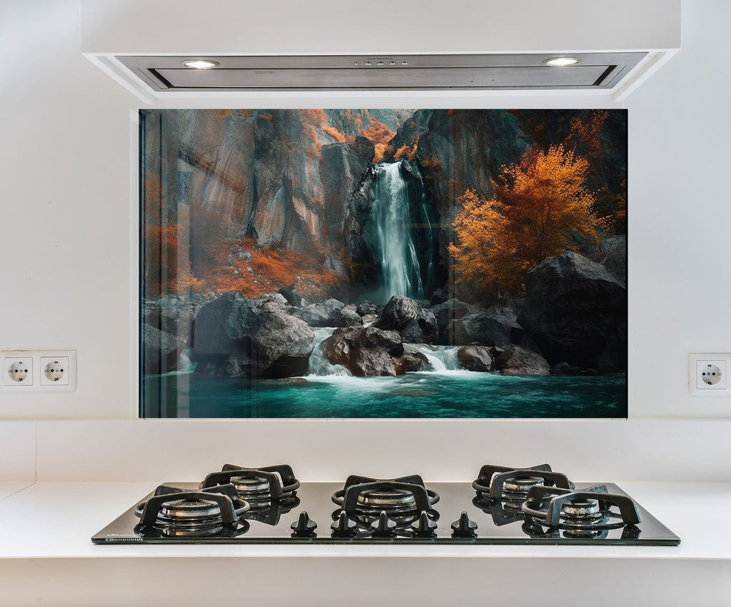 a painting of a waterfall is hanging above a stove