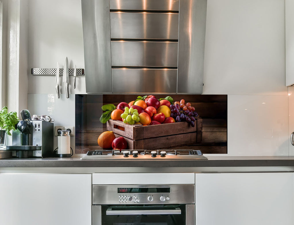 a picture of a box of fruit on a kitchen counter