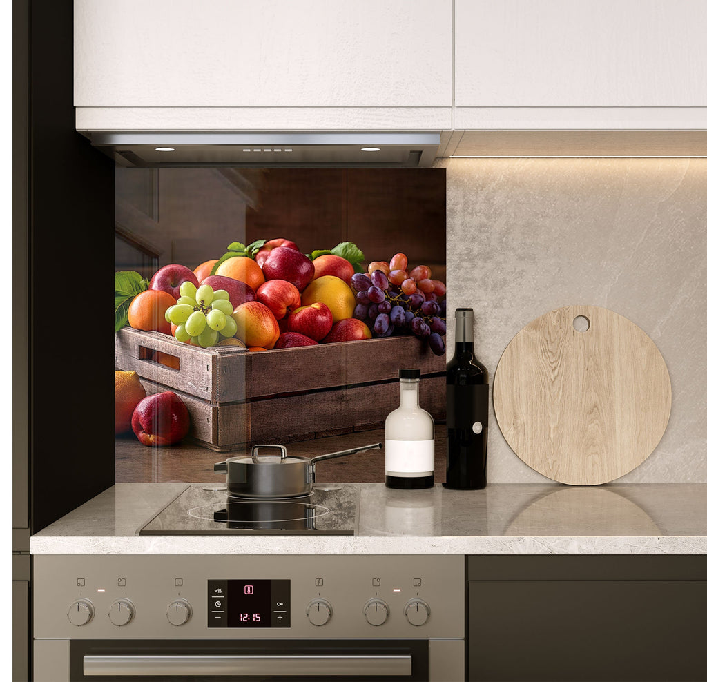 a kitchen counter with a cutting board and a bowl of fruit