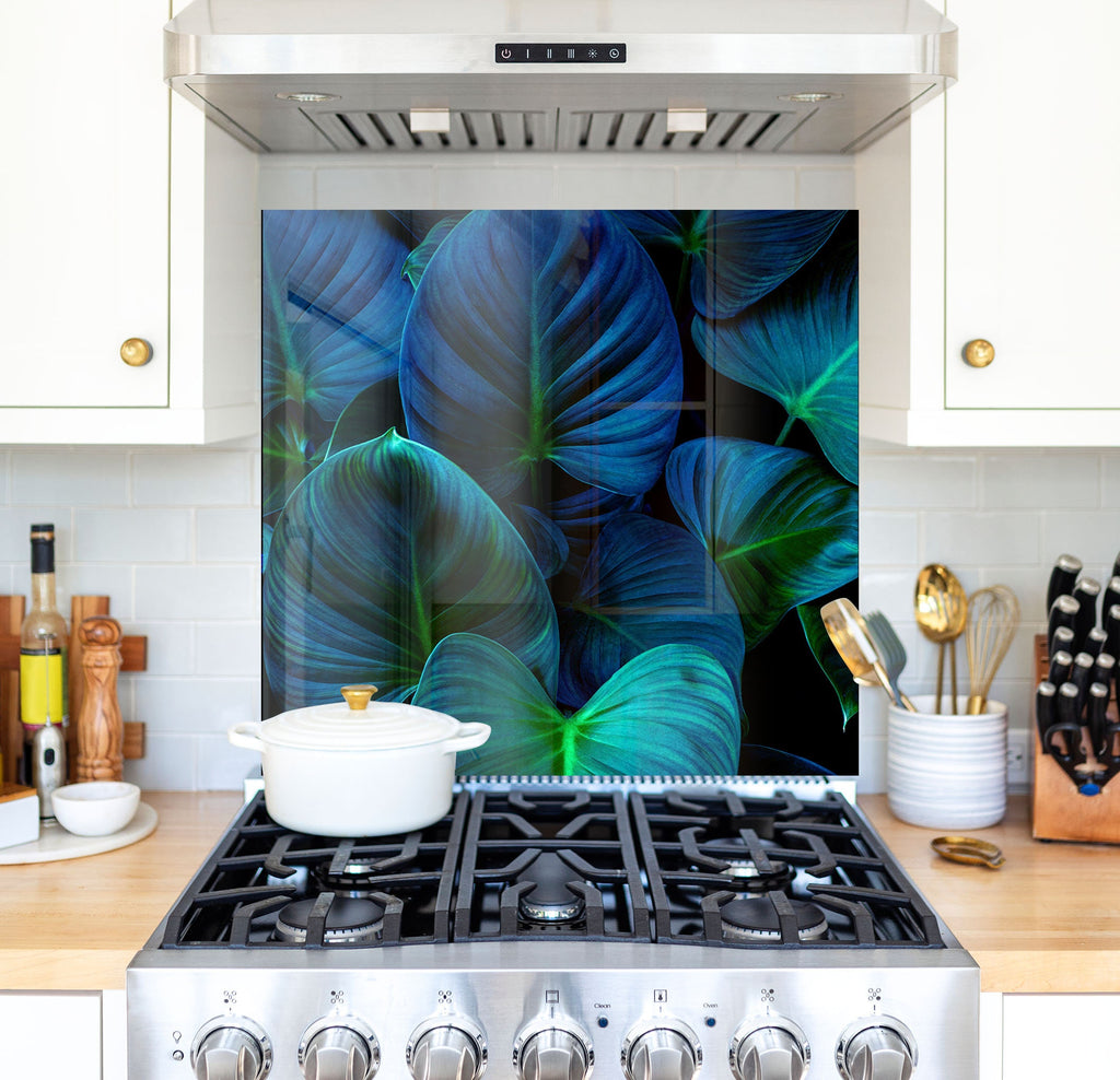 a stove top oven sitting inside of a kitchen