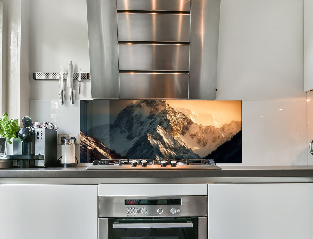 a stove top oven sitting inside of a kitchen