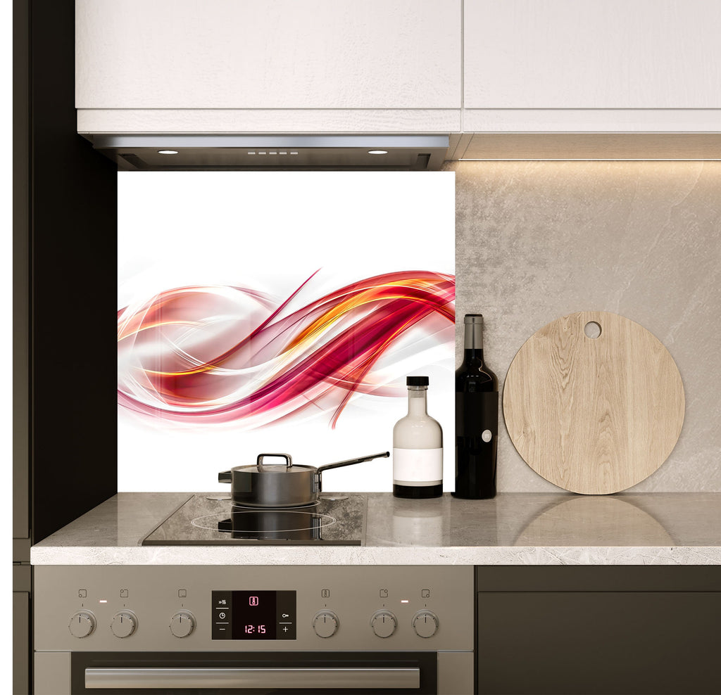 a stove top oven sitting next to a wooden cutting board