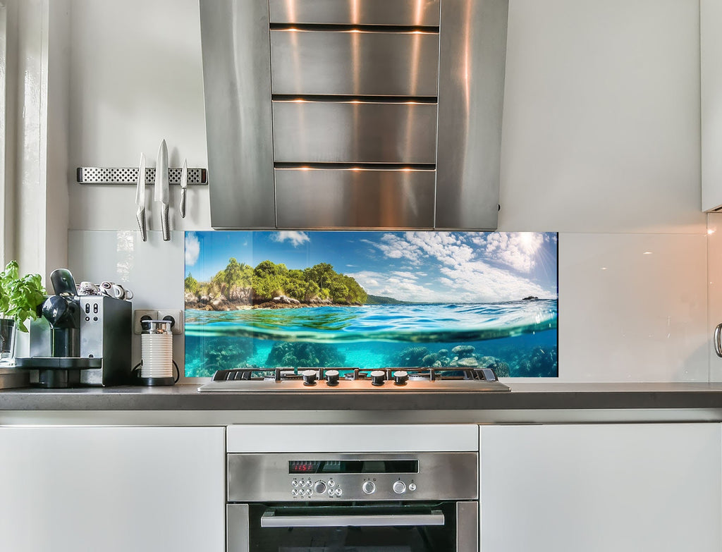 a kitchen with a stainless steel stove top oven