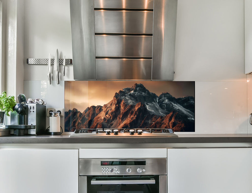 a stove top oven sitting inside of a kitchen