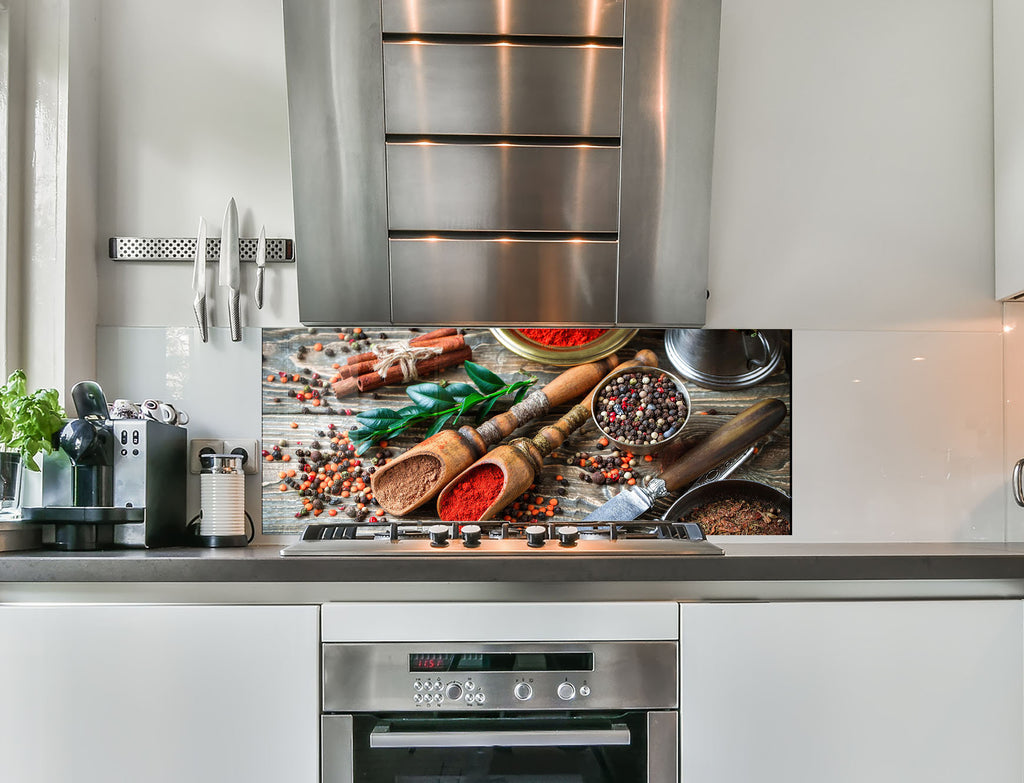 a kitchen with a stainless steel stove top oven