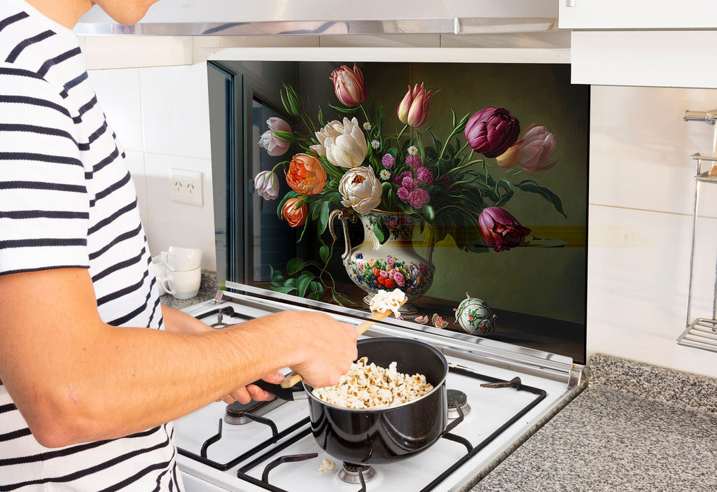 a man is cooking popcorn on the stove