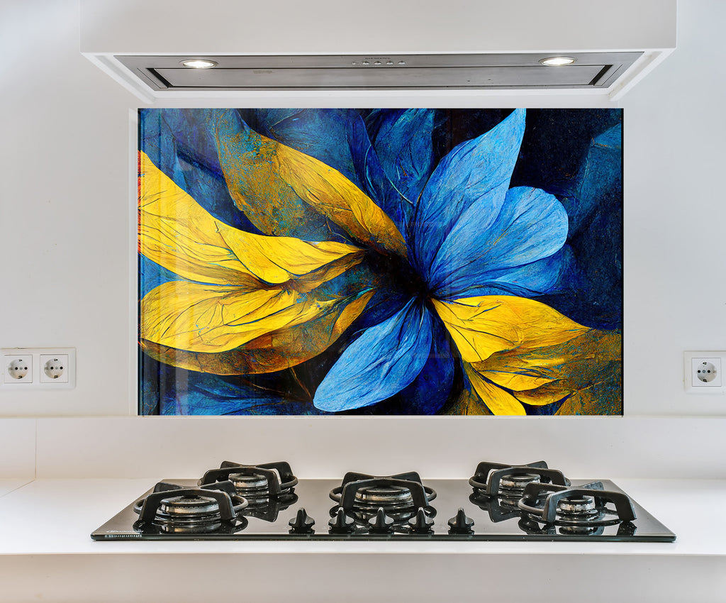 a picture of a blue and yellow flower on a wall above a stove