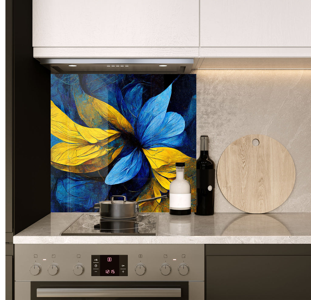 a painting of a blue flower on a wall behind a stove