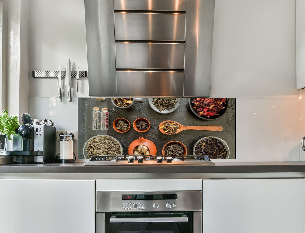 a stove top oven sitting inside of a kitchen