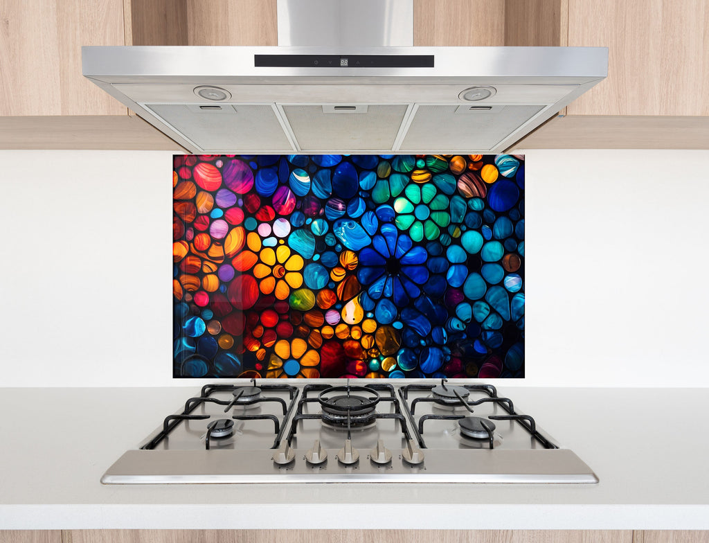 a stove top with a colorful painting on it