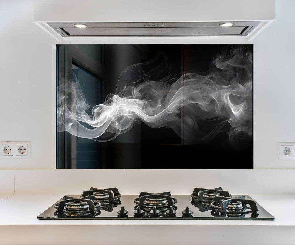 a stove top with a lot of smoke coming out of it