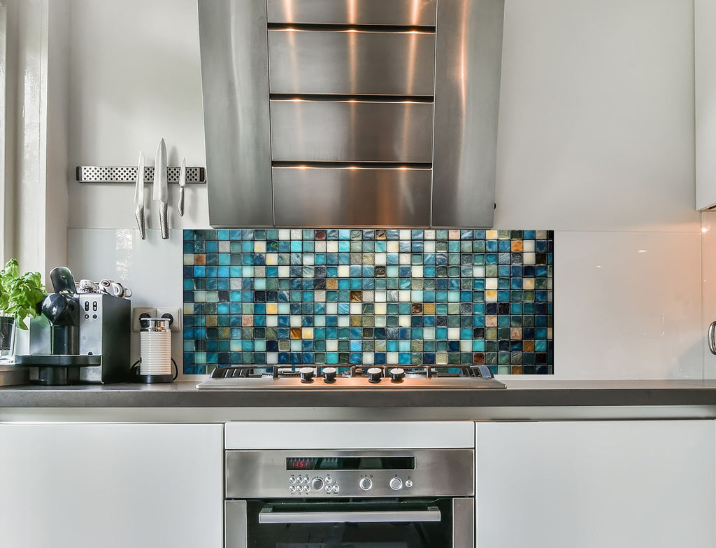 a stove top oven sitting inside of a kitchen