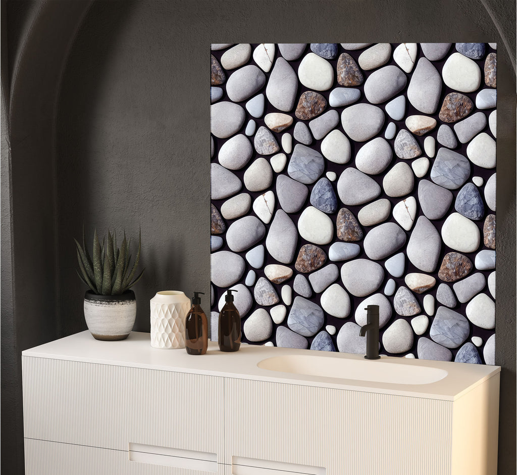 a bathroom with a white cabinet and a stone wall