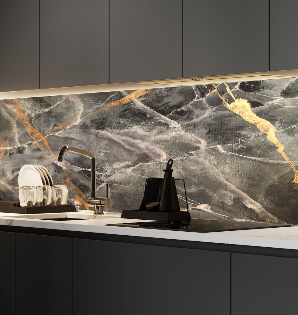 a kitchen with a marble counter top next to a sink