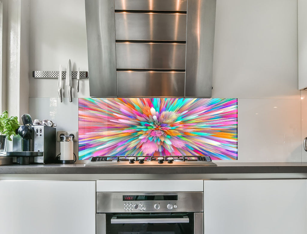 a kitchen with a stove top oven and a large painting on the wall