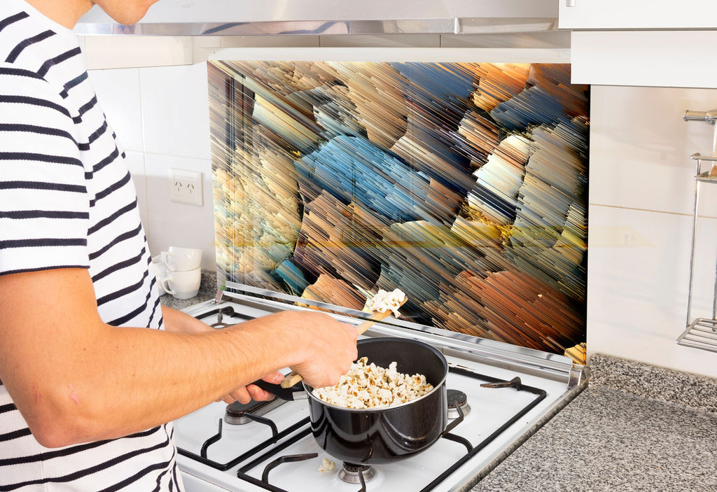 a man is cooking popcorn on the stove