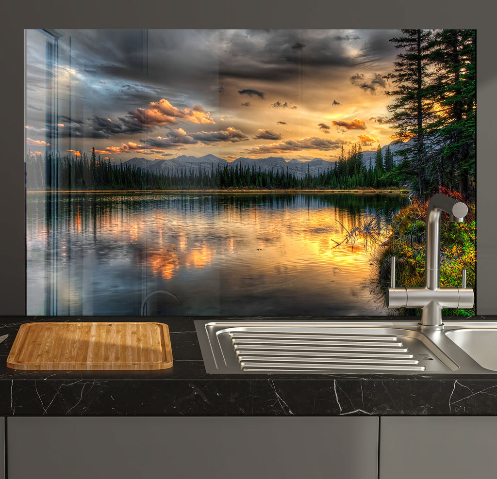 a kitchen with a sink and a painting on the wall