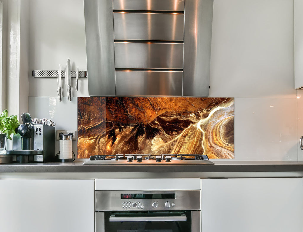 a stove top oven sitting inside of a kitchen