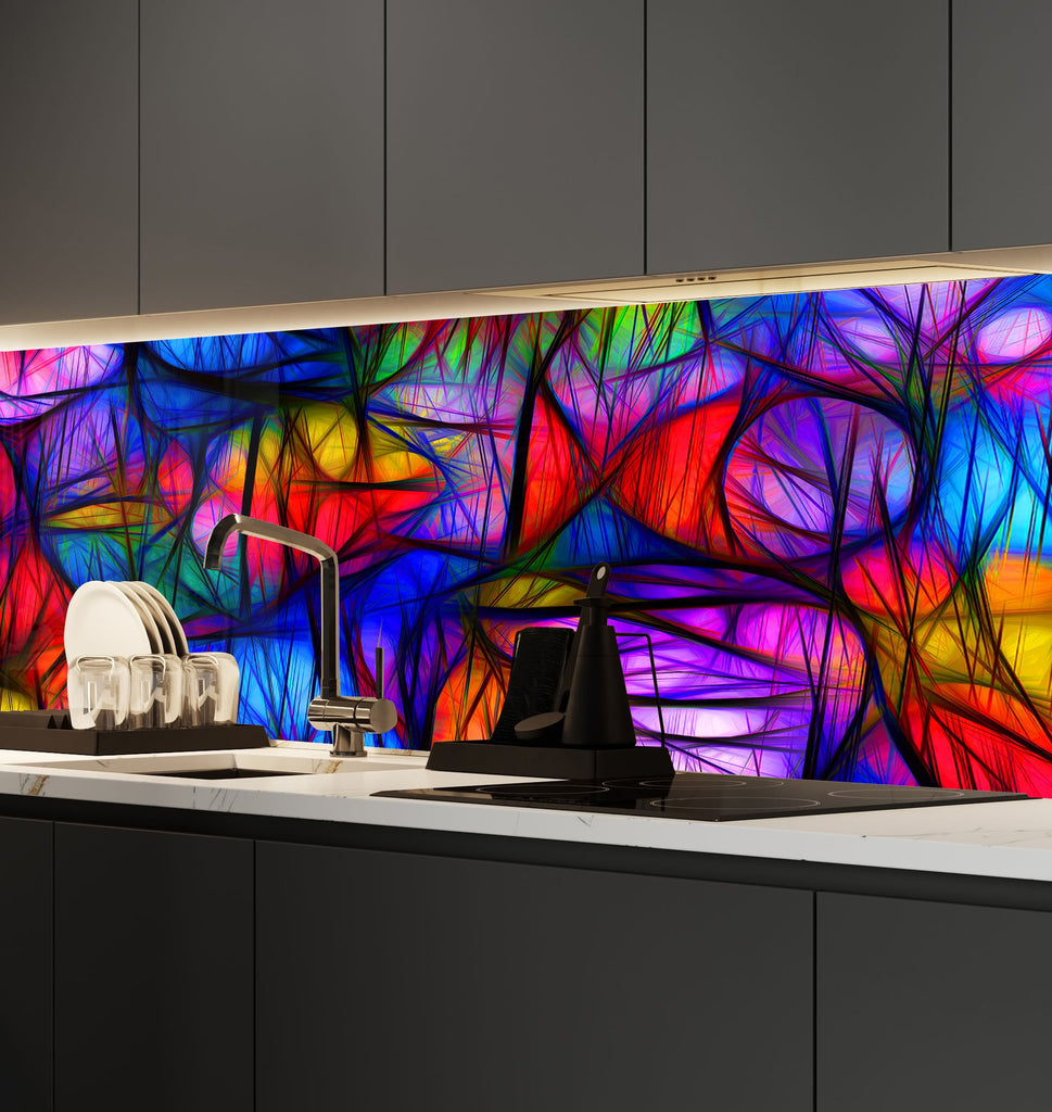 a kitchen counter with a colorful glass design on it