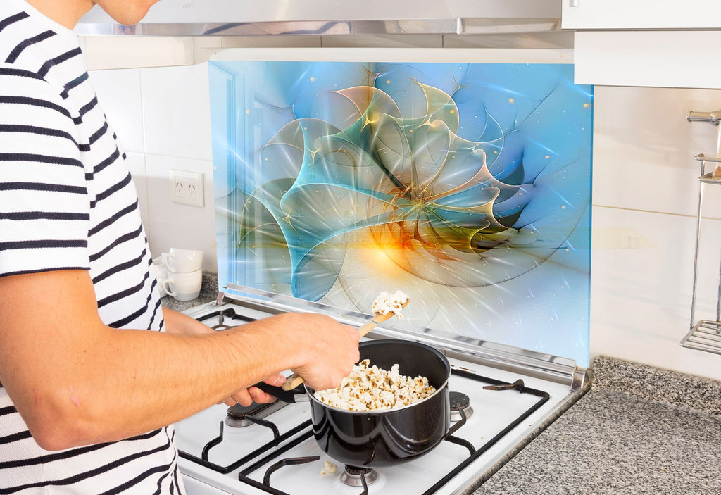 a man is cooking popcorn on the stove