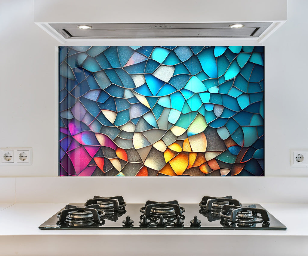 a picture of a multicolored mosaic on a wall above a stove