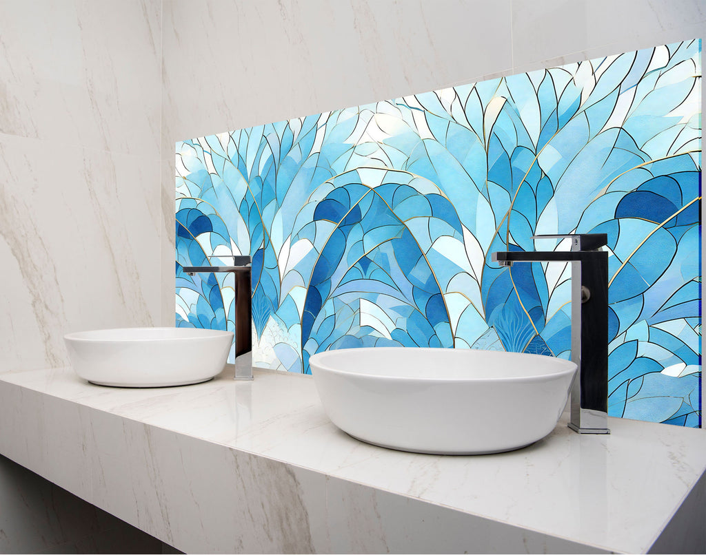 a bathroom with two sinks and a mosaic wall