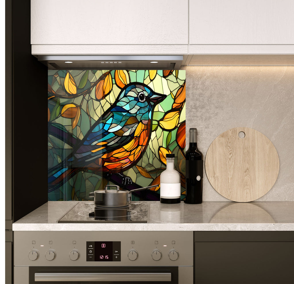 a kitchen with a stove top oven and a stained glass window