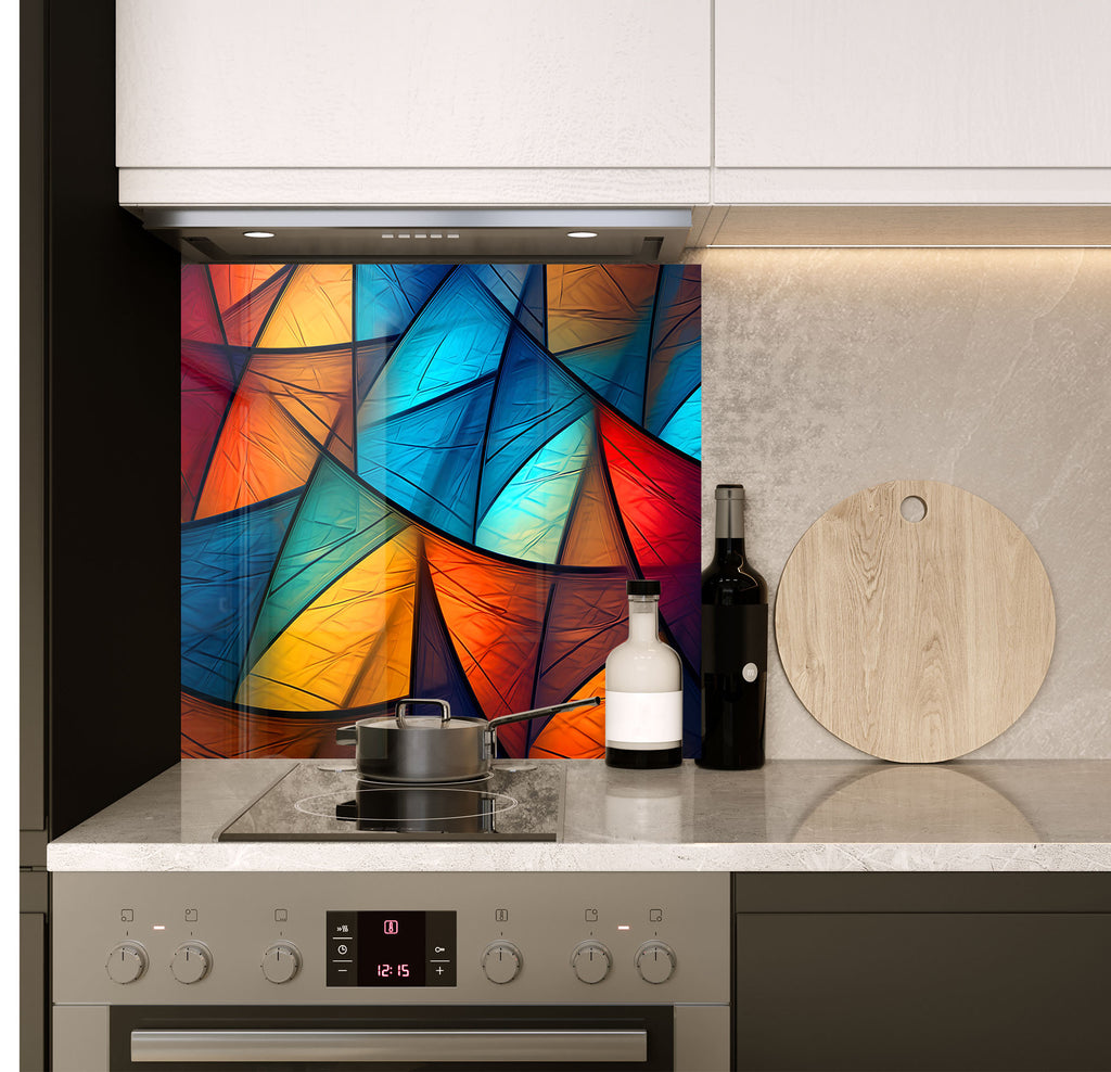 a stove top oven sitting under a colorful painting