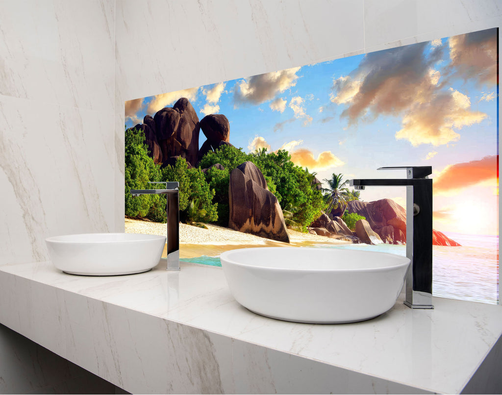 a bathroom with two sinks and a painting on the wall