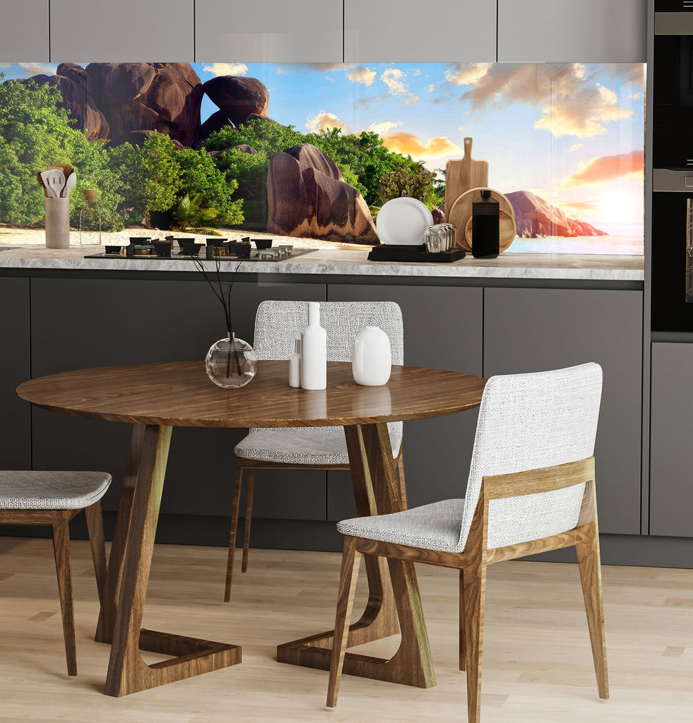 a kitchen with a table and chairs and a painting on the wall